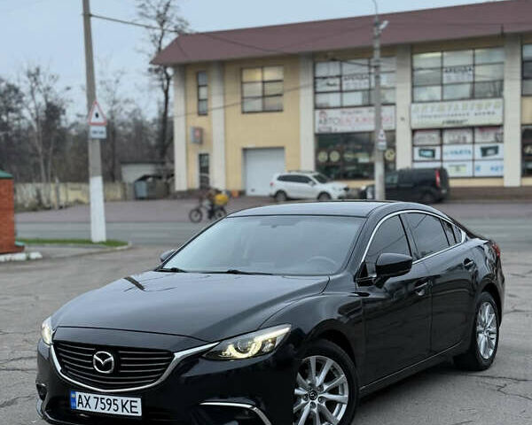 Черный Мазда 6, объемом двигателя 2.49 л и пробегом 148 тыс. км за 11000 $, фото 1 на Automoto.ua