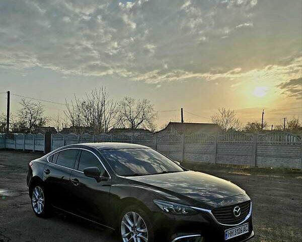 Черный Мазда 6, объемом двигателя 2.49 л и пробегом 178 тыс. км за 13600 $, фото 1 на Automoto.ua