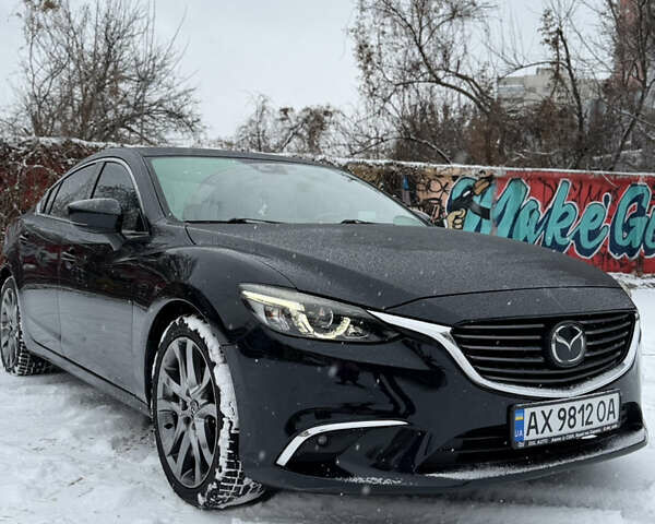Черный Мазда 6, объемом двигателя 2.49 л и пробегом 155 тыс. км за 17000 $, фото 1 на Automoto.ua