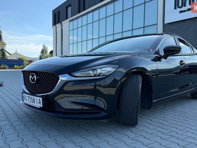 Черный Мазда 6, объемом двигателя 2 л и пробегом 55 тыс. км за 20000 $, фото 1 на Automoto.ua