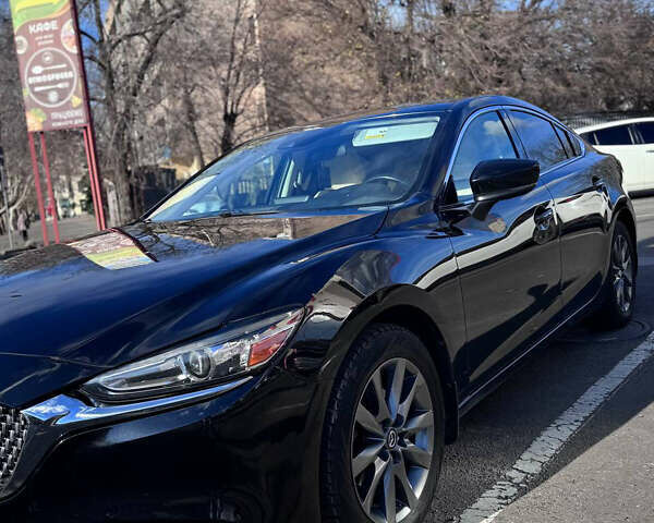 Чорний Мазда 6, об'ємом двигуна 2.49 л та пробігом 98 тис. км за 16300 $, фото 1 на Automoto.ua