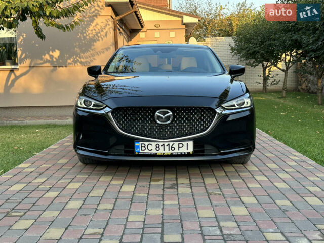 Черный Мазда 6, объемом двигателя 2.49 л и пробегом 80 тыс. км за 14500 $, фото 1 на Automoto.ua
