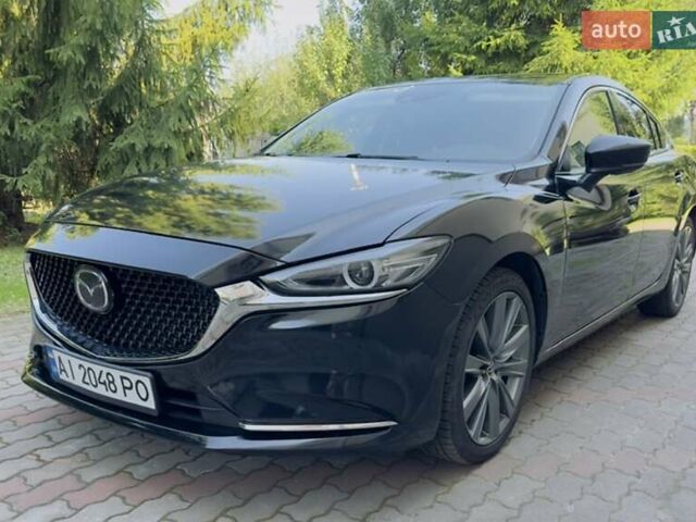 Черный Мазда 6, объемом двигателя 2.5 л и пробегом 99 тыс. км за 17290 $, фото 1 на Automoto.ua