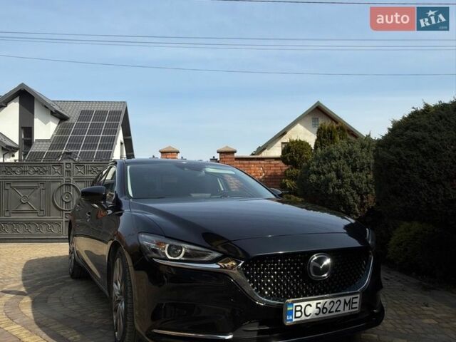 Черный Мазда 6, объемом двигателя 2.49 л и пробегом 197 тыс. км за 15500 $, фото 1 на Automoto.ua