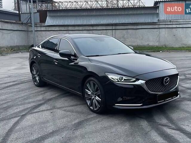 Черный Мазда 6, объемом двигателя 2.49 л и пробегом 66 тыс. км за 15600 $, фото 1 на Automoto.ua