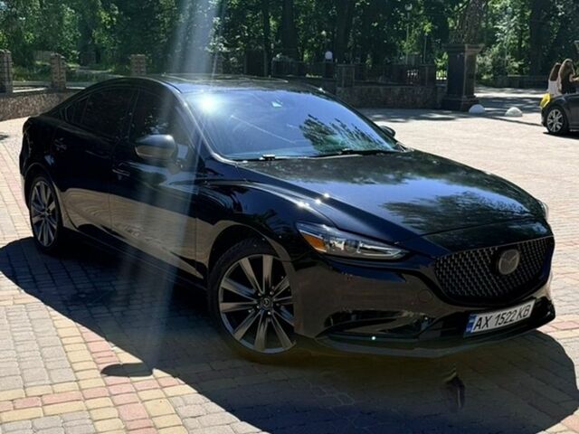 Черный Мазда 6, объемом двигателя 2.49 л и пробегом 163 тыс. км за 16300 $, фото 1 на Automoto.ua