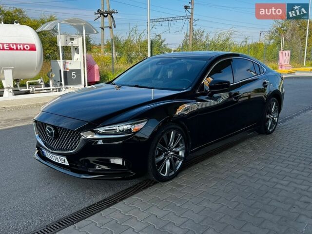 Черный Мазда 6, объемом двигателя 2.5 л и пробегом 184 тыс. км за 17200 $, фото 1 на Automoto.ua