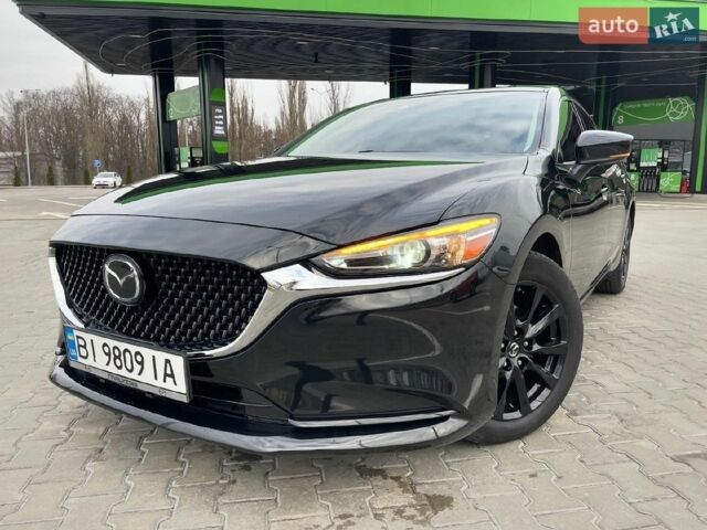 Черный Мазда 6, объемом двигателя 2.49 л и пробегом 75 тыс. км за 17900 $, фото 1 на Automoto.ua