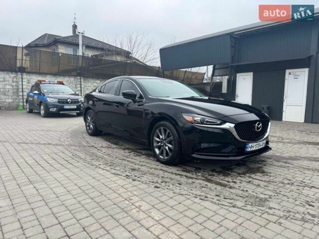 Черный Мазда 6, объемом двигателя 2.49 л и пробегом 112 тыс. км за 15700 $, фото 1 на Automoto.ua