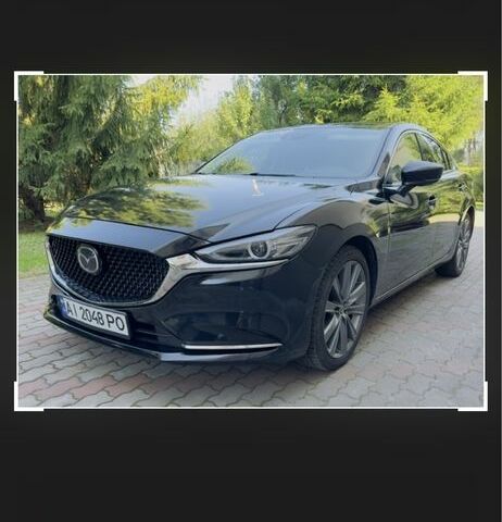Черный Мазда 6, объемом двигателя 2.5 л и пробегом 100 тыс. км за 17499 $, фото 1 на Automoto.ua