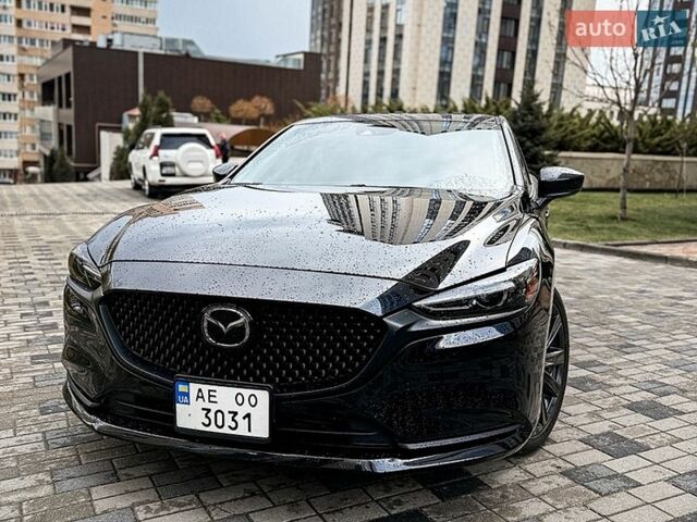 Черный Мазда 6, объемом двигателя 2.49 л и пробегом 65 тыс. км за 18800 $, фото 1 на Automoto.ua
