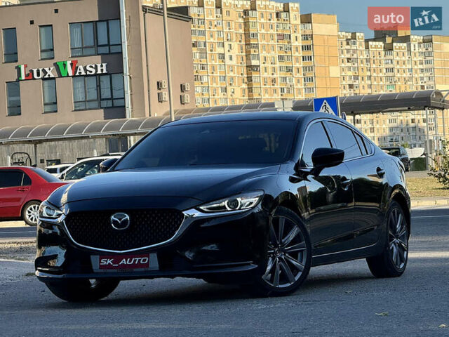 Черный Мазда 6, объемом двигателя 2.49 л и пробегом 145 тыс. км за 16900 $, фото 1 на Automoto.ua