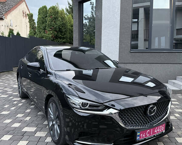Черный Мазда 6, объемом двигателя 2.5 л и пробегом 142 тыс. км за 16700 $, фото 1 на Automoto.ua
