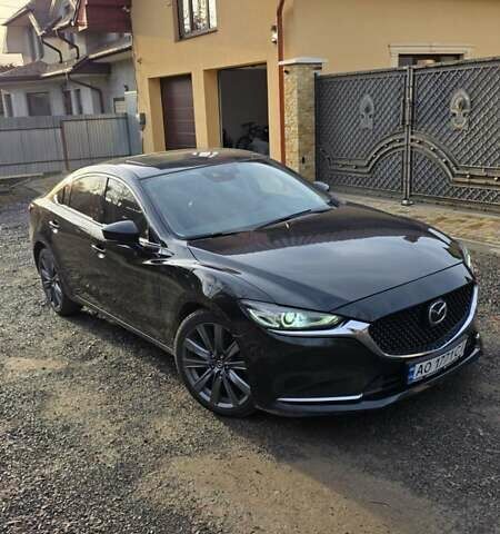 Черный Мазда 6, объемом двигателя 2.49 л и пробегом 97 тыс. км за 17700 $, фото 1 на Automoto.ua