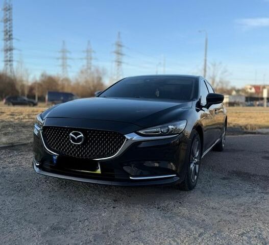 Черный Мазда 6, объемом двигателя 2.49 л и пробегом 53 тыс. км за 16800 $, фото 1 на Automoto.ua