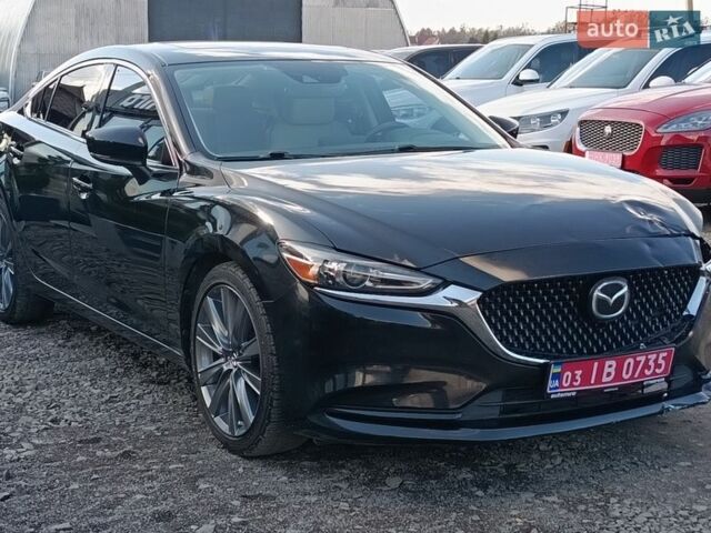 Черный Мазда 6, объемом двигателя 2.5 л и пробегом 142 тыс. км за 11600 $, фото 1 на Automoto.ua