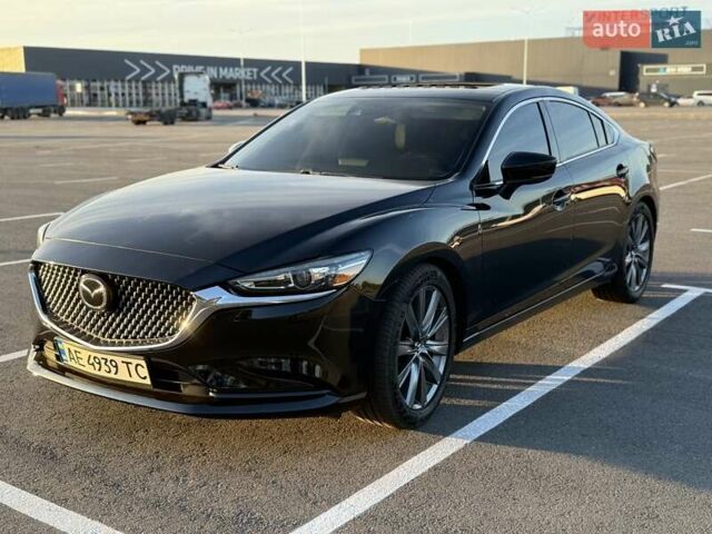 Черный Мазда 6, объемом двигателя 2.49 л и пробегом 128 тыс. км за 15800 $, фото 1 на Automoto.ua
