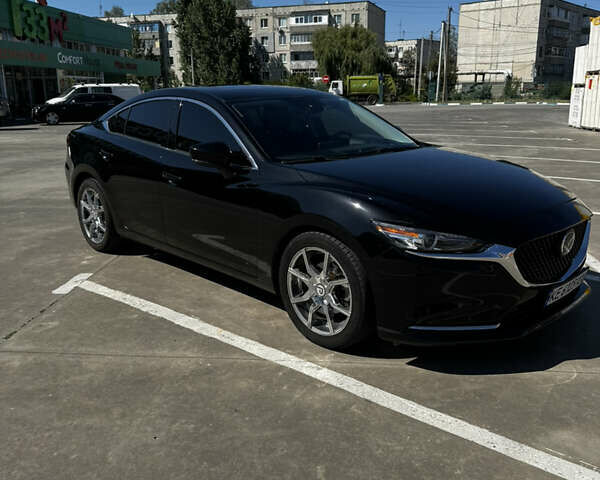 Черный Мазда 6, объемом двигателя 2.49 л и пробегом 87 тыс. км за 21000 $, фото 1 на Automoto.ua