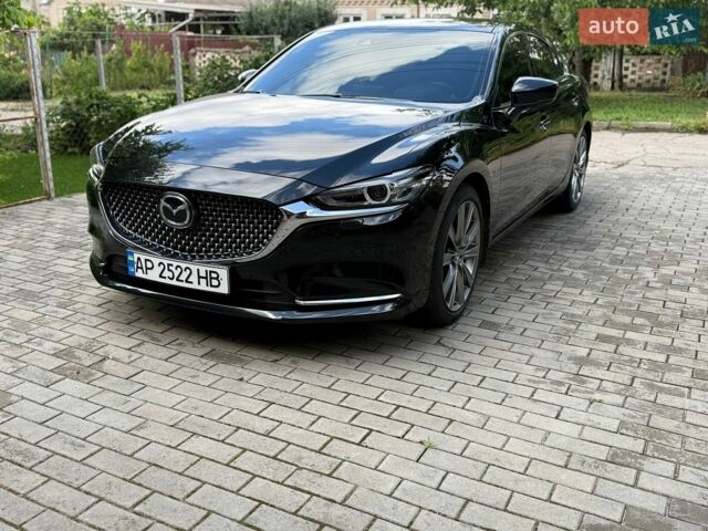 Черный Мазда 6, объемом двигателя 2.49 л и пробегом 105 тыс. км за 24500 $, фото 1 на Automoto.ua