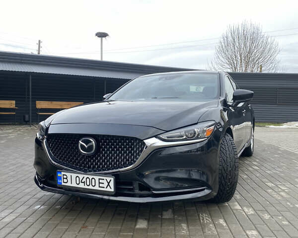 Чорний Мазда 6, об'ємом двигуна 2.49 л та пробігом 134 тис. км за 15000 $, фото 1 на Automoto.ua