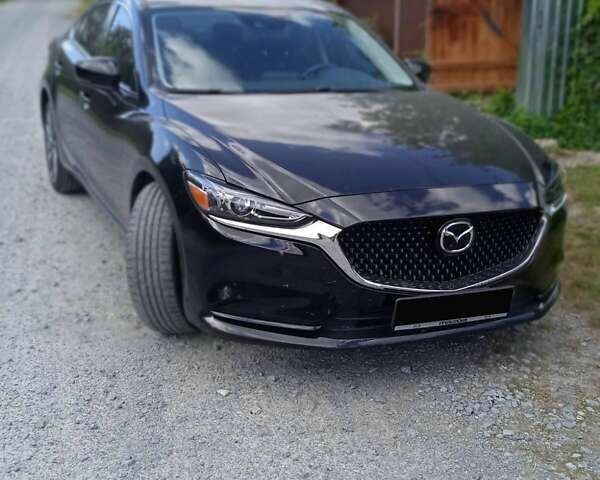 Черный Мазда 6, объемом двигателя 2.5 л и пробегом 38 тыс. км за 18500 $, фото 1 на Automoto.ua