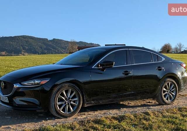 Черный Мазда 6, объемом двигателя 2.49 л и пробегом 111 тыс. км за 14900 $, фото 1 на Automoto.ua