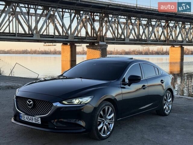 Черный Мазда 6, объемом двигателя 2.49 л и пробегом 144 тыс. км за 16400 $, фото 1 на Automoto.ua