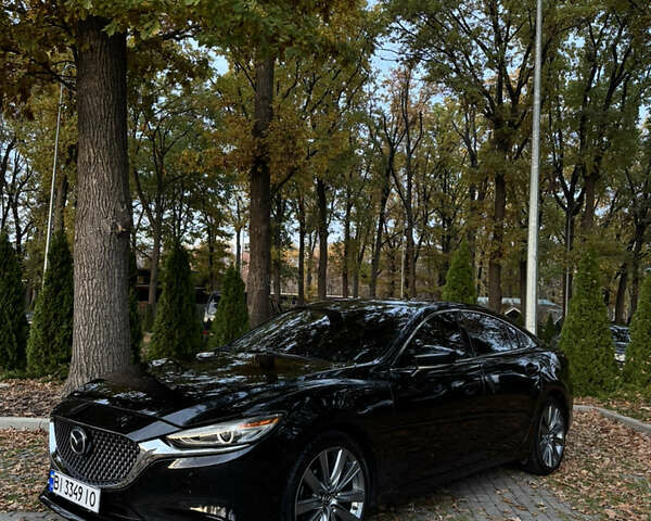 Черный Мазда 6, объемом двигателя 2.49 л и пробегом 155 тыс. км за 15300 $, фото 1 на Automoto.ua
