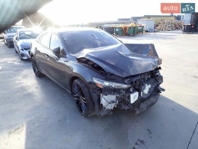 Черный Мазда 6, объемом двигателя 2.49 л и пробегом 256 тыс. км за 6900 $, фото 1 на Automoto.ua