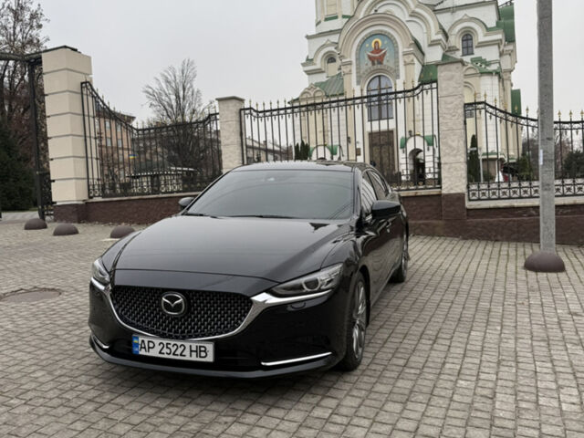 Черный Мазда 6, объемом двигателя 2.49 л и пробегом 95 тыс. км за 24750 $, фото 1 на Automoto.ua