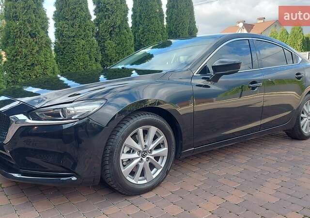 Чорний Мазда 6, об'ємом двигуна 2.49 л та пробігом 60 тис. км за 19900 $, фото 1 на Automoto.ua