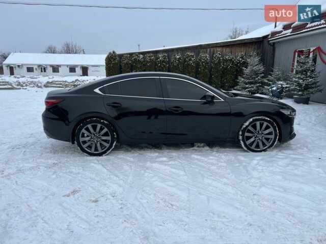 Черный Мазда 6, объемом двигателя 2.49 л и пробегом 158 тыс. км за 19100 $, фото 1 на Automoto.ua