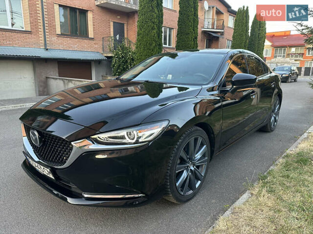 Черный Мазда 6, объемом двигателя 2.49 л и пробегом 132 тыс. км за 18300 $, фото 1 на Automoto.ua