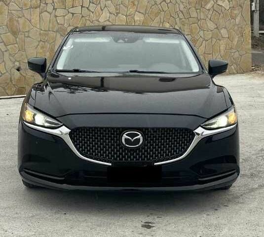 Черный Мазда 6, объемом двигателя 2.5 л и пробегом 116 тыс. км за 12550 $, фото 1 на Automoto.ua