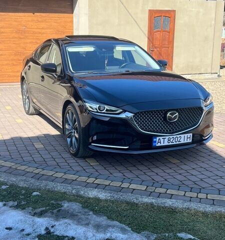 Черный Мазда 6, объемом двигателя 2.49 л и пробегом 97 тыс. км за 18450 $, фото 1 на Automoto.ua