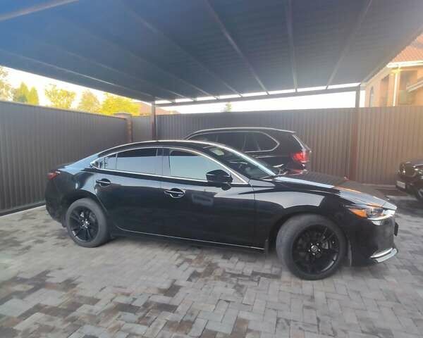 Чорний Мазда 6, об'ємом двигуна 2.5 л та пробігом 22 тис. км за 19999 $, фото 1 на Automoto.ua