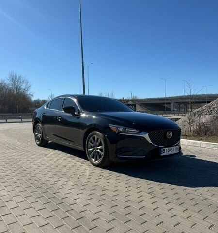 Черный Мазда 6, объемом двигателя 2.49 л и пробегом 110 тыс. км за 16600 $, фото 1 на Automoto.ua