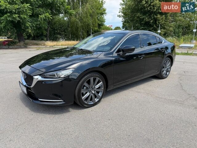 Черный Мазда 6, объемом двигателя 2.49 л и пробегом 54 тыс. км за 16900 $, фото 1 на Automoto.ua