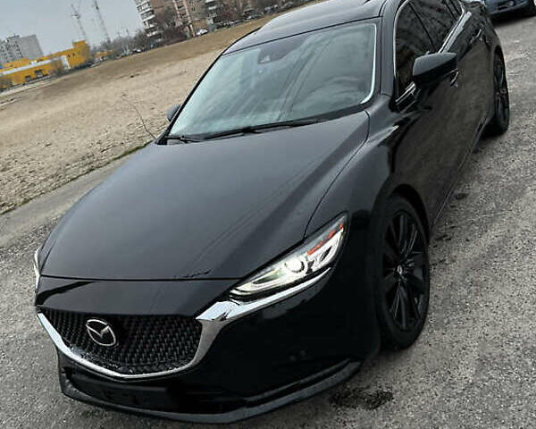Черный Мазда 6, объемом двигателя 2.49 л и пробегом 60 тыс. км за 19000 $, фото 1 на Automoto.ua