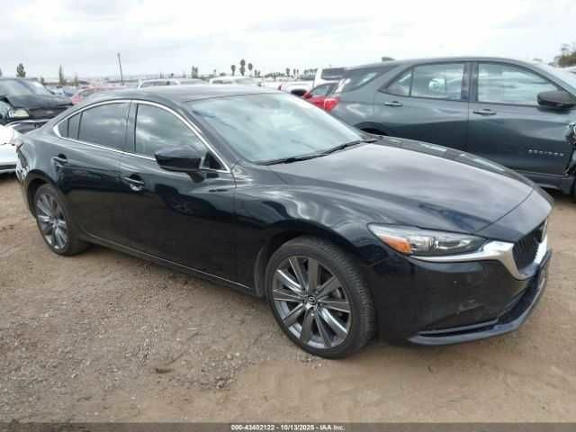 Черный Мазда 6, объемом двигателя 2.5 л и пробегом 87 тыс. км за 14000 $, фото 1 на Automoto.ua