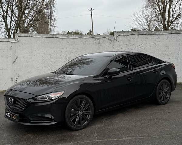 Черный Мазда 6, объемом двигателя 2.49 л и пробегом 65 тыс. км за 19500 $, фото 1 на Automoto.ua