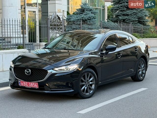 Черный Мазда 6, объемом двигателя 2.5 л и пробегом 184 тыс. км за 16500 $, фото 1 на Automoto.ua