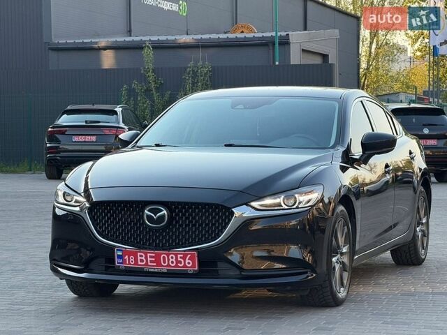 Черный Мазда 6, объемом двигателя 2.49 л и пробегом 182 тыс. км за 16500 $, фото 1 на Automoto.ua