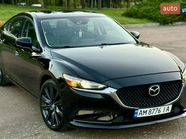 Черный Мазда 6, объемом двигателя 2.49 л и пробегом 111 тыс. км за 17900 $, фото 1 на Automoto.ua