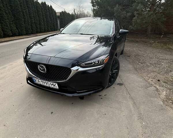 Черный Мазда 6, объемом двигателя 2.49 л и пробегом 119 тыс. км за 17200 $, фото 1 на Automoto.ua