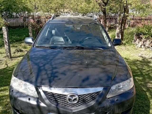 Черный Мазда 6, объемом двигателя 2 л и пробегом 378 тыс. км за 2150 $, фото 1 на Automoto.ua