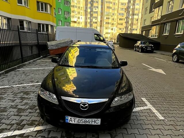 Черный Мазда 6, объемом двигателя 2 л и пробегом 300 тыс. км за 2500 $, фото 1 на Automoto.ua