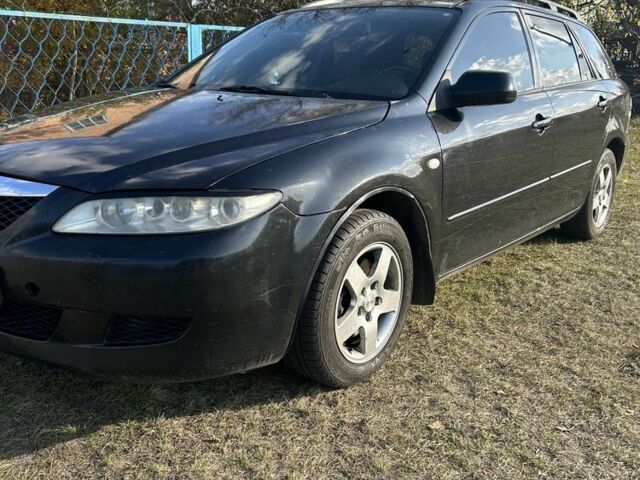 Черный Мазда 6, объемом двигателя 2 л и пробегом 342 тыс. км за 3100 $, фото 1 на Automoto.ua