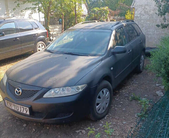 Черный Мазда 6, объемом двигателя 1.8 л и пробегом 290 тыс. км за 1800 $, фото 1 на Automoto.ua
