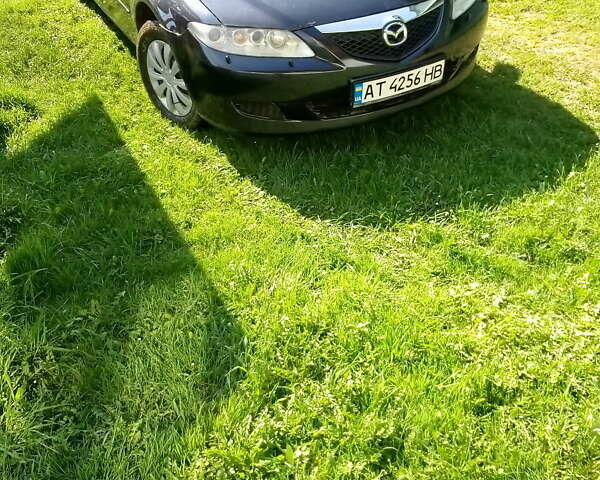 Черный Мазда 6, объемом двигателя 2 л и пробегом 249 тыс. км за 3500 $, фото 1 на Automoto.ua